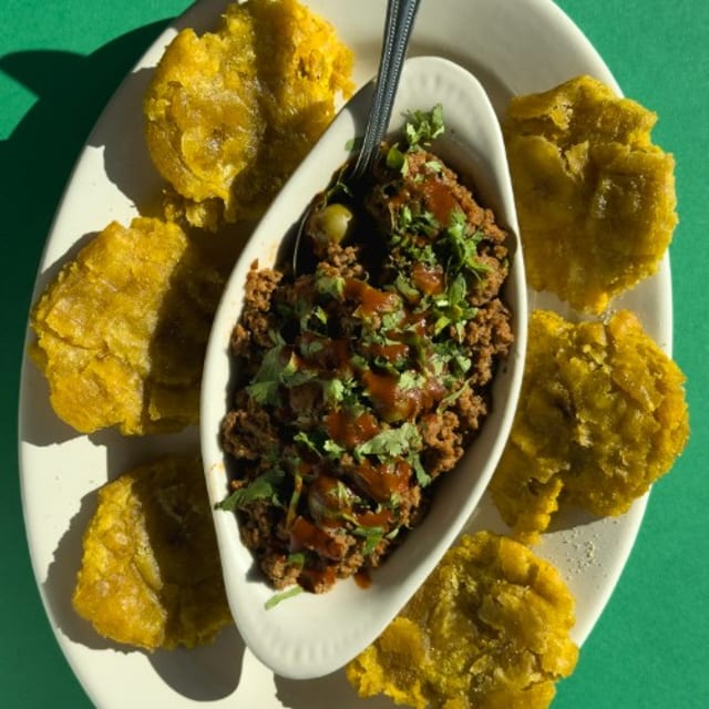 Tostones with Picadillo.